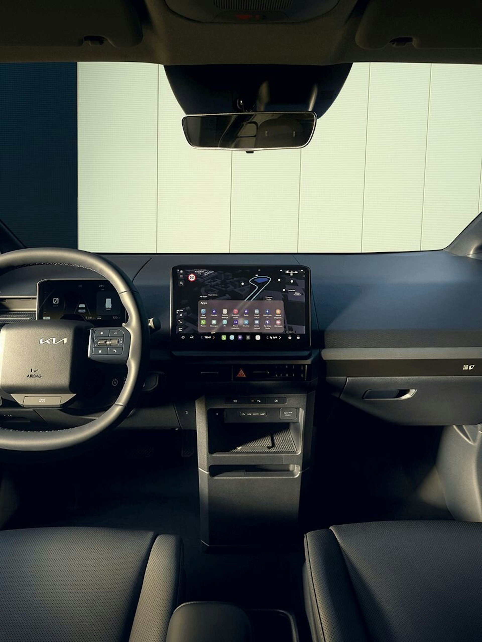 Heckansicht des Kia PV5 Cargo mit platzsparendem Design, schnellem Zugang und hoher Ladekapazität